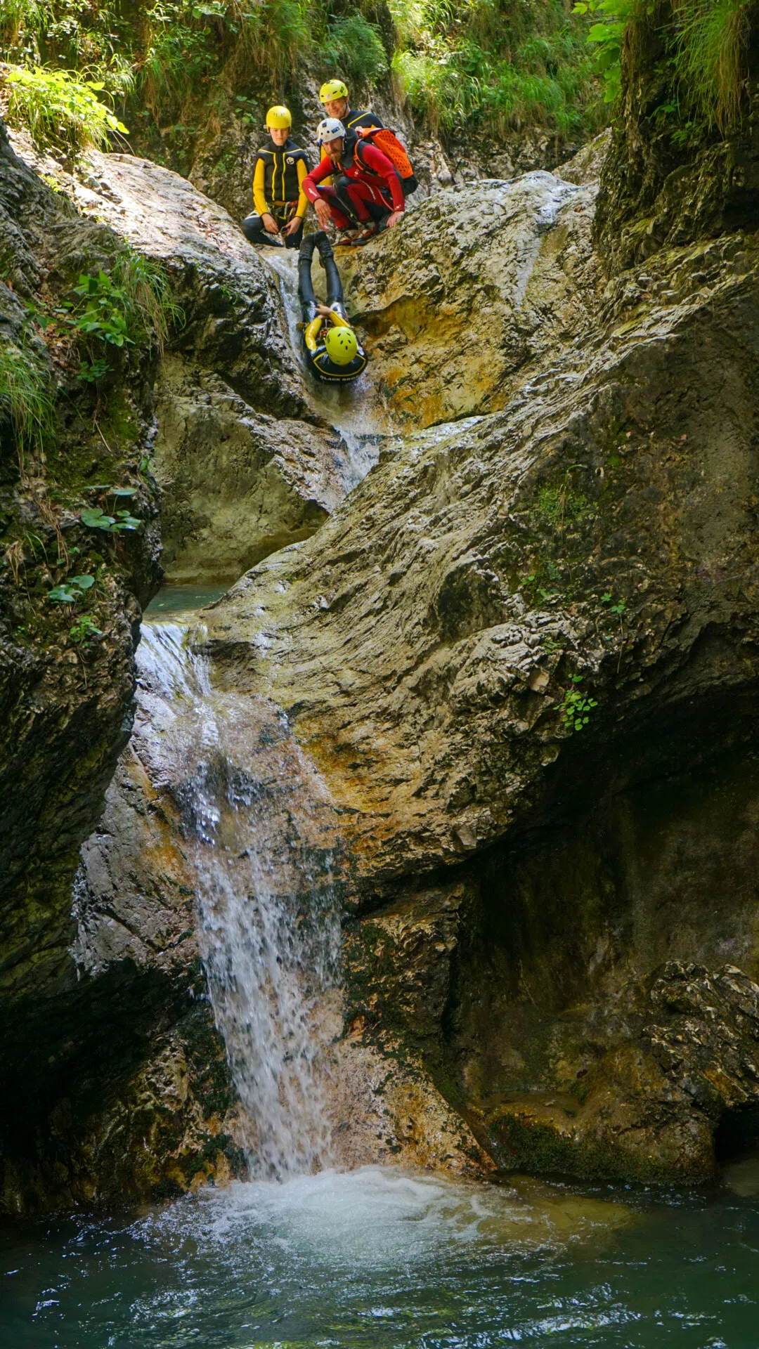 Canyoning in Sušec Gorge with natural rock slides